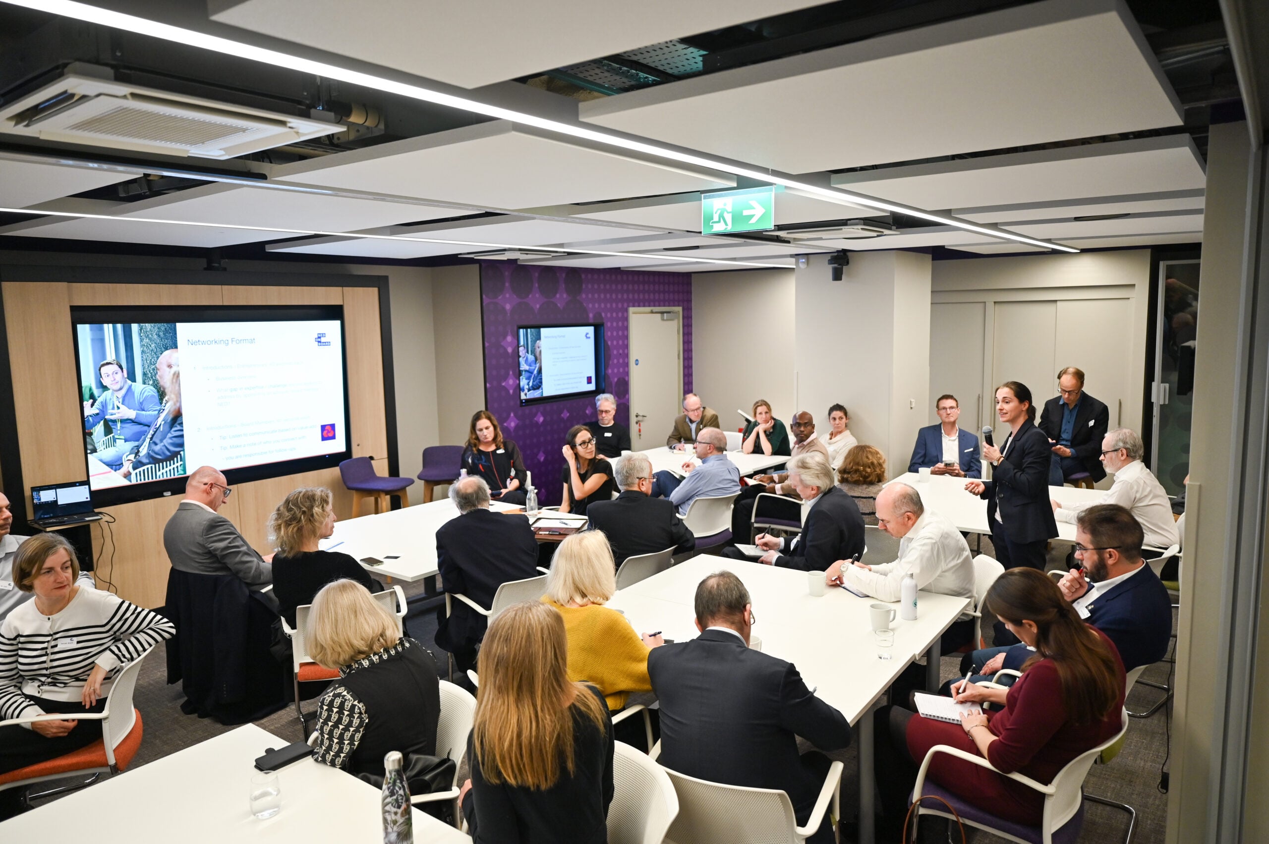 Entrepreneurs pitching potential advisory board member at a NEDonBoard event