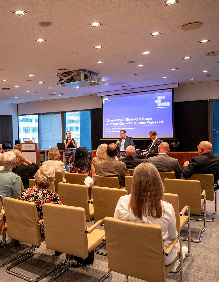 People attending some seminar where a speaker is speaking.