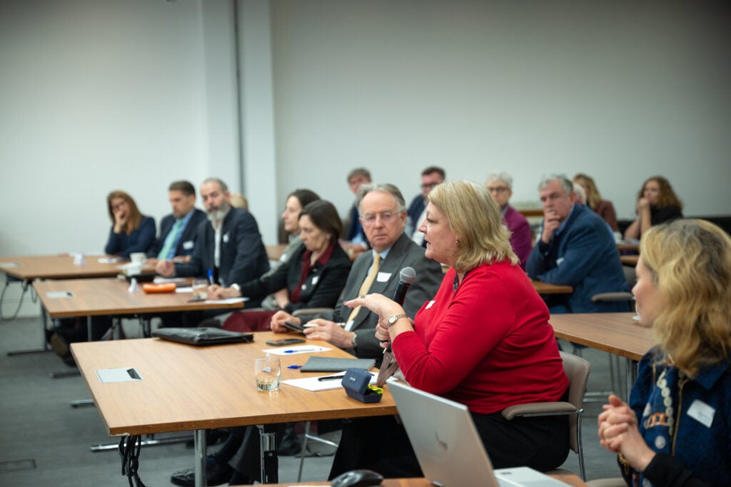 Non-executive directors attending a panel event for their ongoing professional development