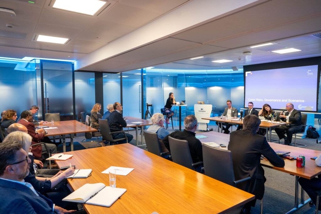 People attending a meeting in a boardroom