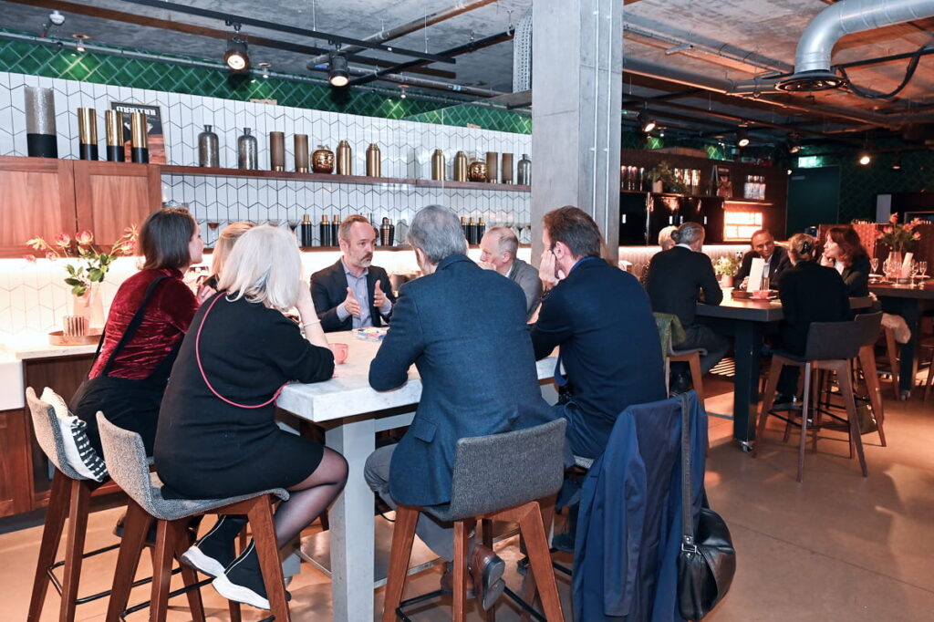 group of people sitting around for a discussion